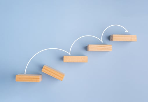 Business growth up to top overcoming challenges, and skips the crisis with a jump on a positive statistic. Business crisis management photo