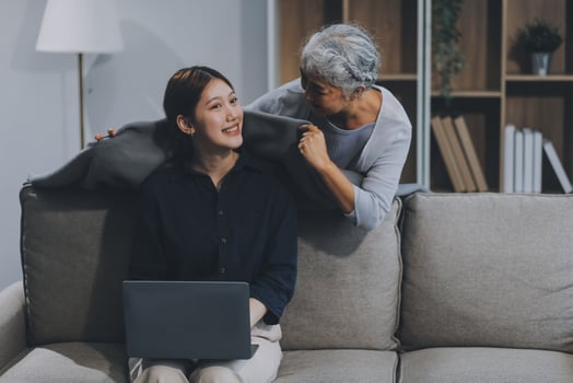 Asian elderly women and friend using social media and living room. streaming, happiness and conversation at a house with old people together photo