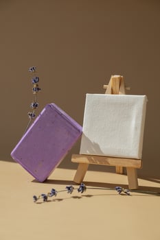 Paper note template mock up copy space Handmade aromatic spa lavender soap. Natural additives and extracts. Bar of lavender soap with dried flowers. Beauty treatment product herbal ecological organic cosmetics. Copy space photo