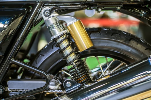 motorcycle shock absorbers with sub tank on top, big bike. photo