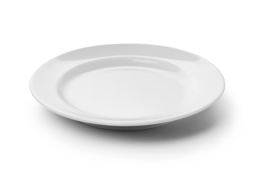A white ceramic plate isolated on a white background. photo