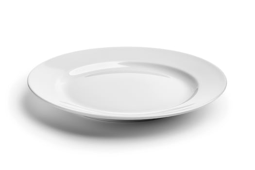 A white ceramic plate isolated on a white background. photo