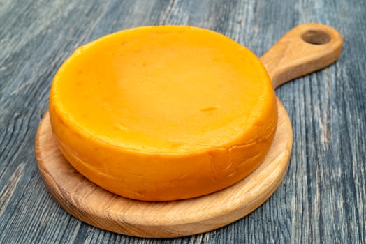 Fresh, round cheese. photo