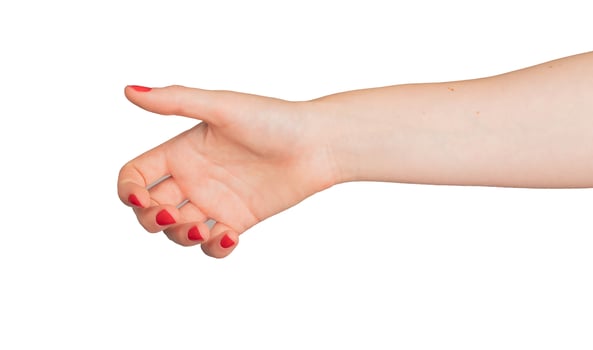 Hand grasping empty space. Arm gesture showing product, object. Beautiful red manicure, fingernails, photo