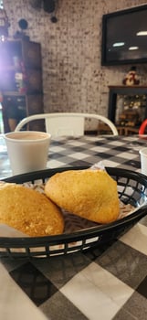 breakfast with cheese bread and a glass of espresso photo