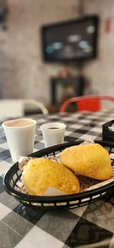 breakfast with cheese bread and a glass of espresso photo