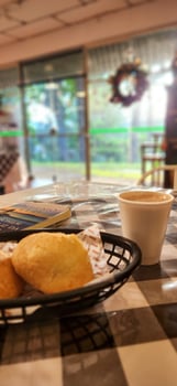 breakfast with cheese bread and a glass of espresso photo