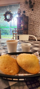 breakfast with cheese bread and a glass of espresso photo