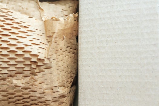 Eco friendly brown paper honeycomb wrap for product packaging parcel carton box photo