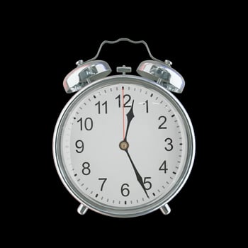 12h 26m AM or PM Vintage Steel Alarm Clock photo