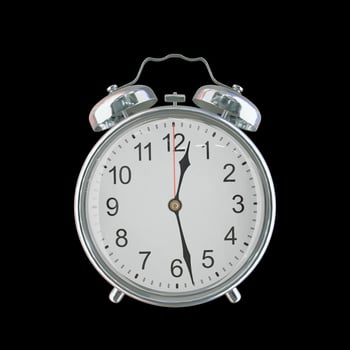 12h 28m AM or PM Vintage Steel Alarm Clock photo