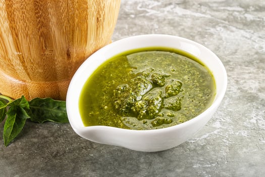 Homemade vegetarian basil pesto sauce photo