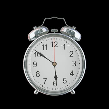 5h 51m PM or AM Vintage Steel Alarm Clock photo