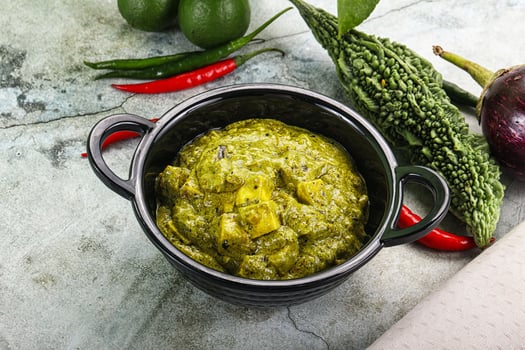 Indian cuisine - palak paneer cheese with spinach photo