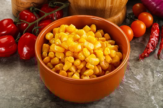 Sweet canned ripe corn grain photo