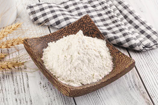 Wheat flour heap for bake photo