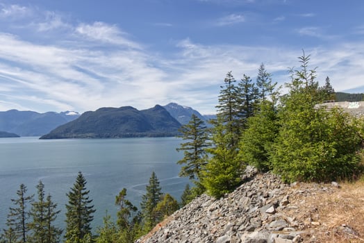 Scenic Mountains And Pacific Ocean Coast View shot on a highway between West Vancouver and Squamish at Sunny Day photo