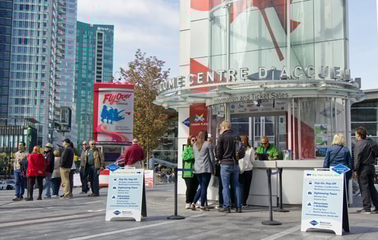 Vancouver, Canada - September 20, 2019 People are buying the tickets from tourist's Centre near Canada Place in Vancouver. photo