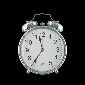 11h 36m PM or AM Vintage Steel Alarm Clock photo