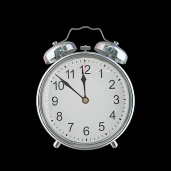 11h 52m PM or AM Vintage Steel Alarm Clock photo