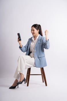 Portrait of young businesswoman posing on white background photo