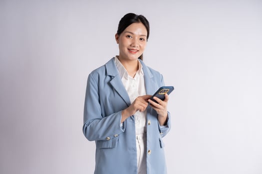 Portrait of young businesswoman posing on white background photo