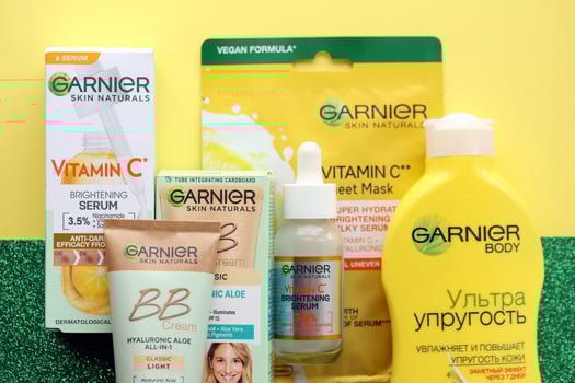 KYIV, UKRAINE - APRIL 20, 2024 Garnier production with company logo. Garnier is a mass market cosmetics brand of French cosmetics company L'Oreal photo
