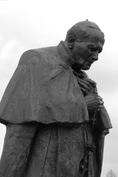 Sculpture close view background. Monument art. Black and white monochrome grayscale photo