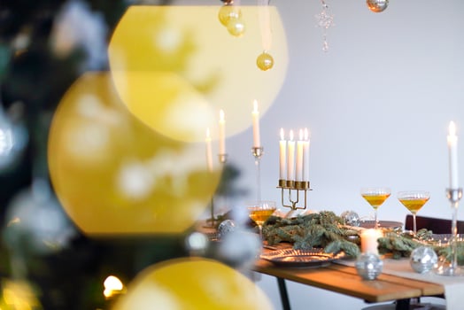 Glasses of sparkling wine on wooden table on Christmas photo
