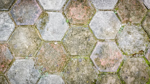 neatly arranged hexagonal conblocks for road coverings photo