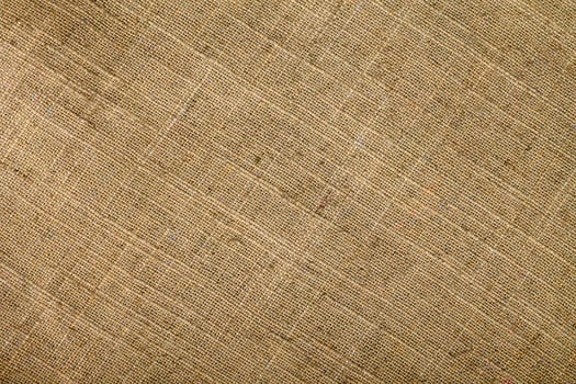 Natural linen material textile canvas Fabric texture background Close-up detail of fabric natural color Hemp material pattern design wallpaper. can be used as background or for graphic design photo