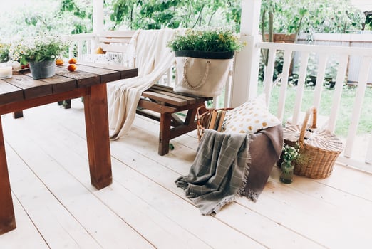 Cozy veranda with bench and flowers photo