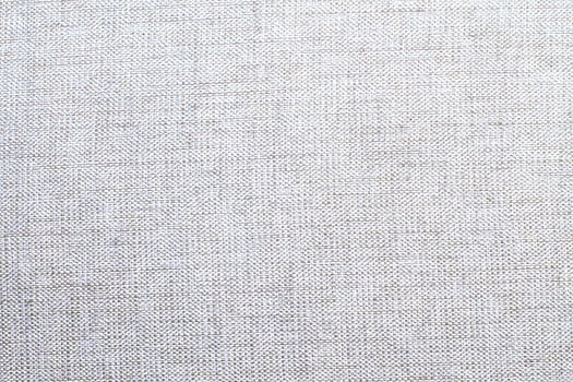 Natural linen material textile canvas Fabric texture background Close-up detail of fabric natural color Hemp material pattern design wallpaper. can be used as background or for graphic design photo