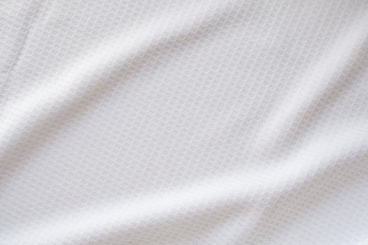 White sports clothing fabric football shirt jersey texture abstract background photo