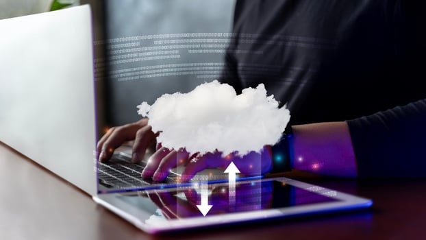 Computing resources and cloud technology concept storage. Businessman using laptop with cloud computer icon. photo