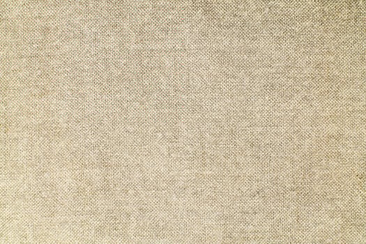 Natural linen material textile canvas Fabric texture background Close-up detail of fabric natural color Hemp material pattern design wallpaper. can be used as background or for graphic design photo