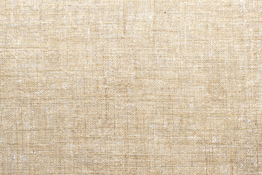 Natural linen material textile canvas Fabric texture background Close-up detail of fabric natural color Hemp material pattern design wallpaper. can be used as background or for graphic design photo