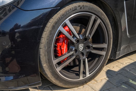Gaziveren, Cyprus -07.23.2024 Porsche Panamera Alloy Wheel and Caliper Close Up photo