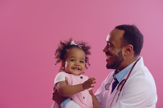 Pediatric Doctor with Smiling Child on Pink Background photo