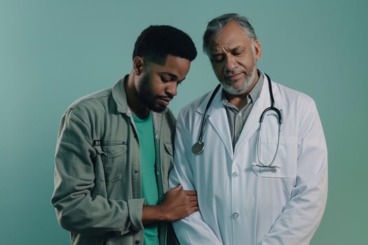 Male doctor offering warm comfort and support to a patient showcasing empathy background photo