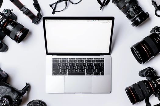 Laptop Mockup Background Surrounded by Camera Gear photo