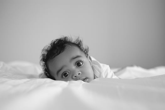 Playful Baby Expressions Captured in Joyful and Adorable Moments photo