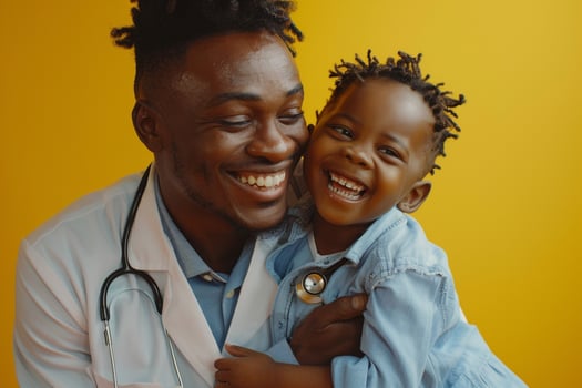 Pediatrician with Stethoscope and Smiling Child photo