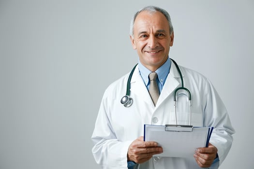 Doctor with Medical Chart and Warm Smile in Professional Clinic Background photo