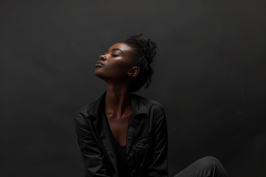 Model in a  desktop setup outfit presenting a polished look photo