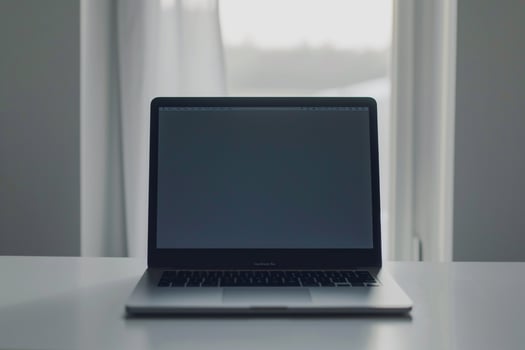 Productivity ed Laptop Mockup Background on white desk photo