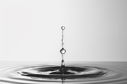 Single Water Droplet Impacting a Pool of Water for Liquid Dynamics photo