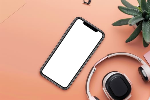 Mobile Device Mockup with Headphones in Study Area Background photo