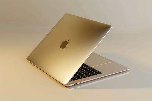Laptop Mockup with a Neutral Beige Background Ideal for Tech Resources and Demos photo