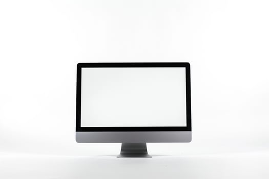 Computer Mockup Background with Wireless Keyboard and High Tech Desk photo